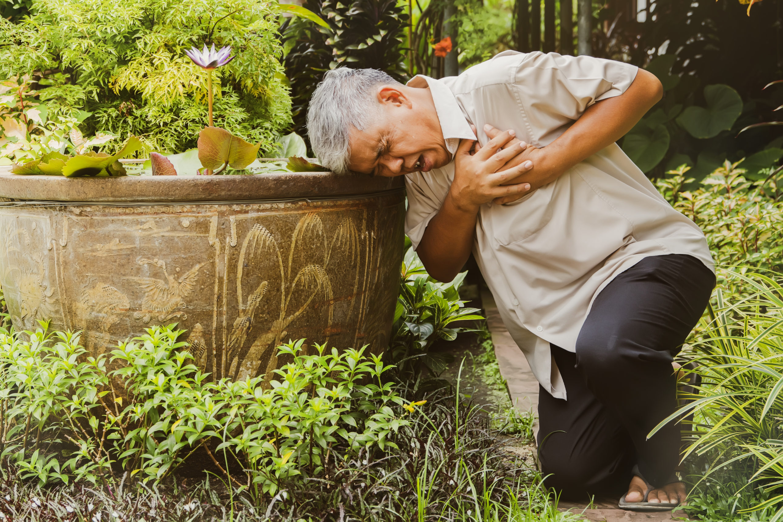 Sixty-year-old,Asian,Man,,His,Body,Collapsed,On,The,Ground,Next